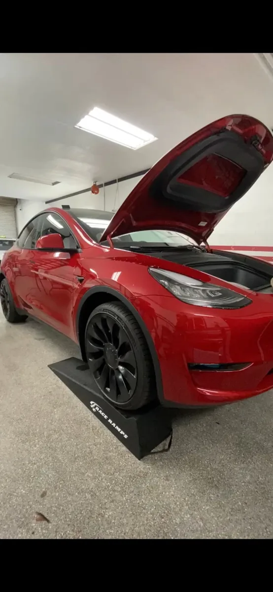 Red coupe inside the Superior shop