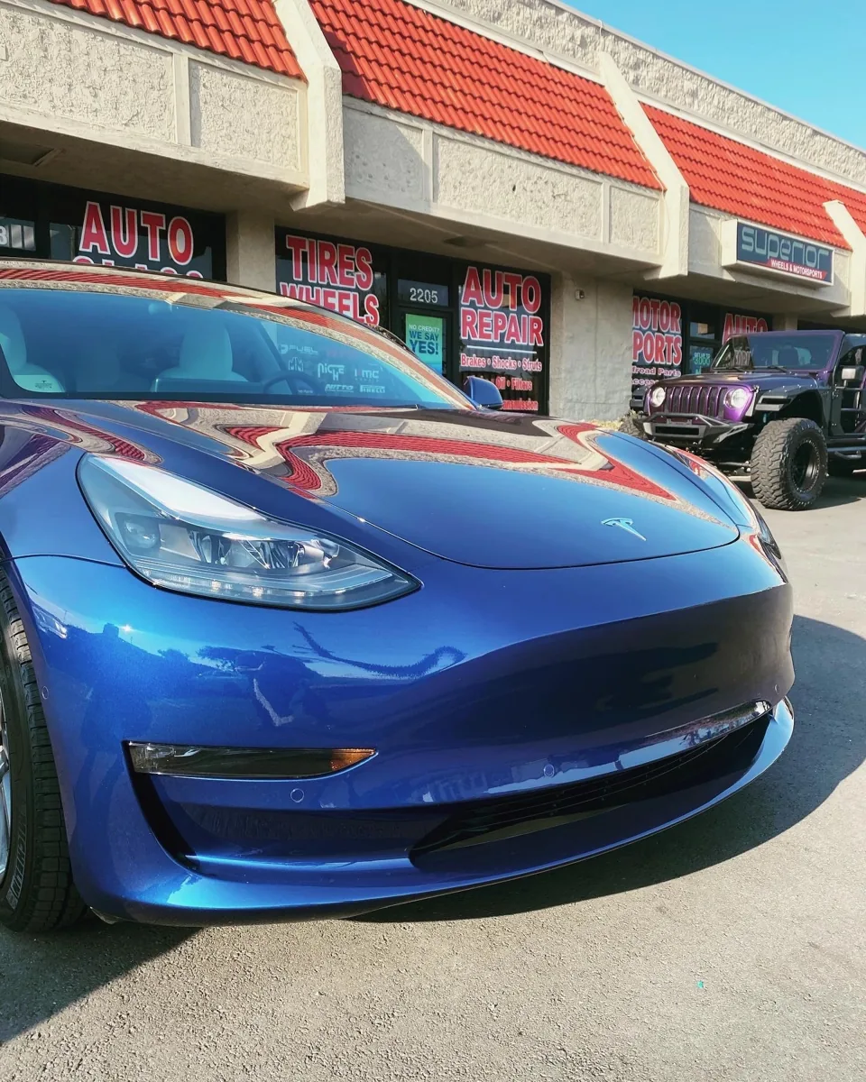 Blue Tesla outside Superior’s Ontario storefront